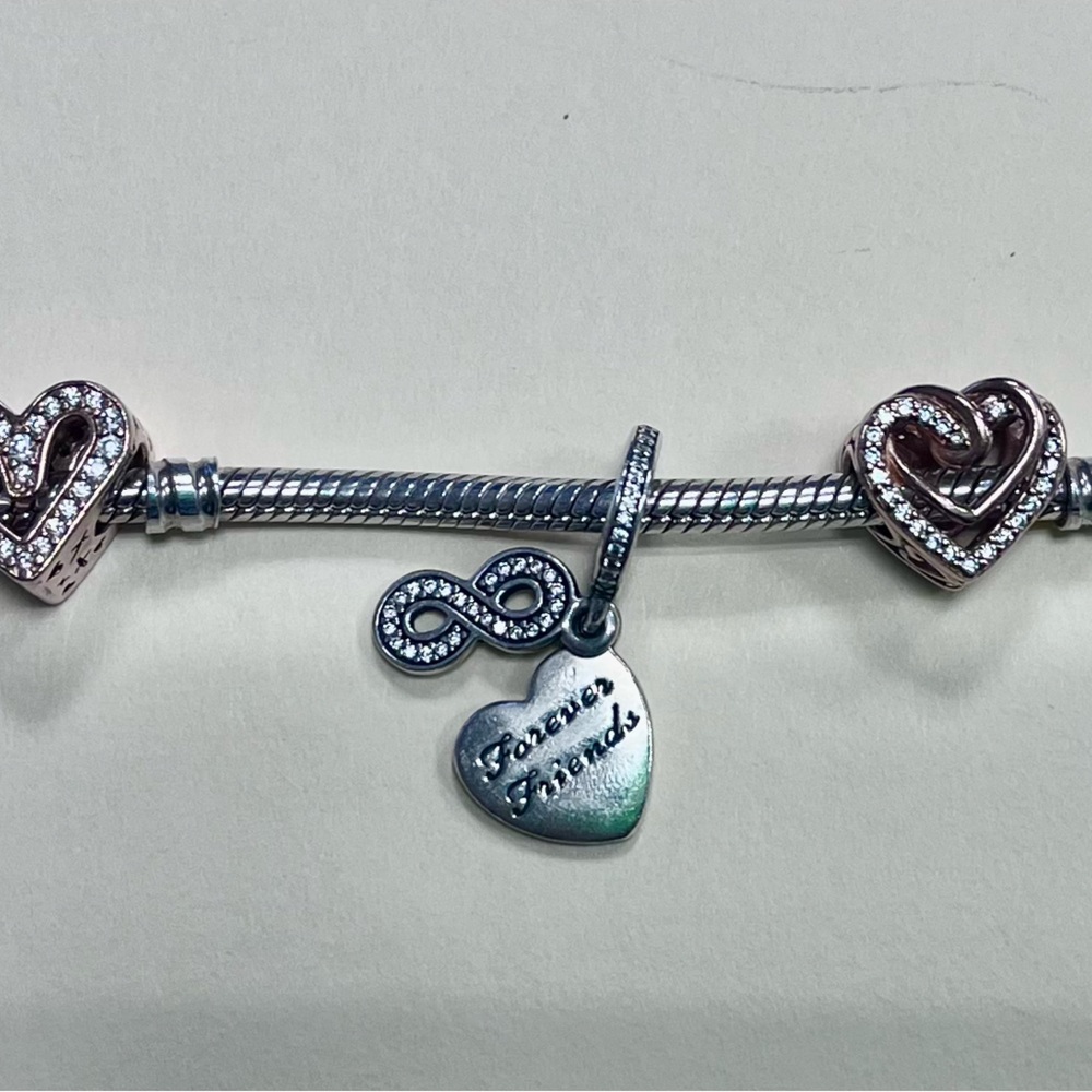 Pandora rose gold snake chain bracelet with charms